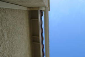 Landscaping Rain Gutter Bent Reattach - Landscaping