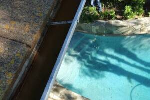 Landscaping Rain Gutter Debris Cleaning - Landscaping