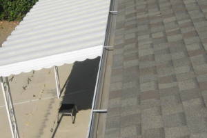 Landscaping Rain Gutter Leaves Debris Cleaning - Landscaping