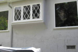 Painting Stucco Window Wall Cracks - Painting