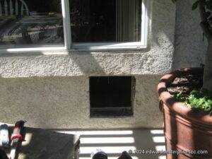 Hole for pet door through stucco from the outside. The door has not yet been installed