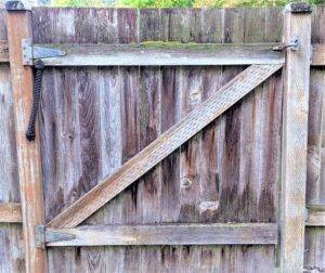 How to Repair or Adjust a Wood Fence Gate After Winter Rain and Snow